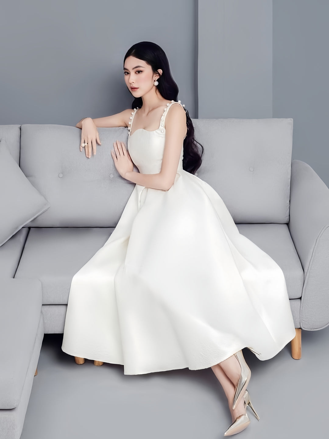 White dress with pearl-embellished straps