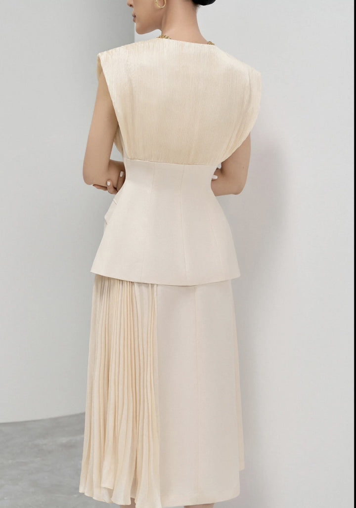 Elegant Beige Sleeveless Dress with Pleated Design and Gold Buttons