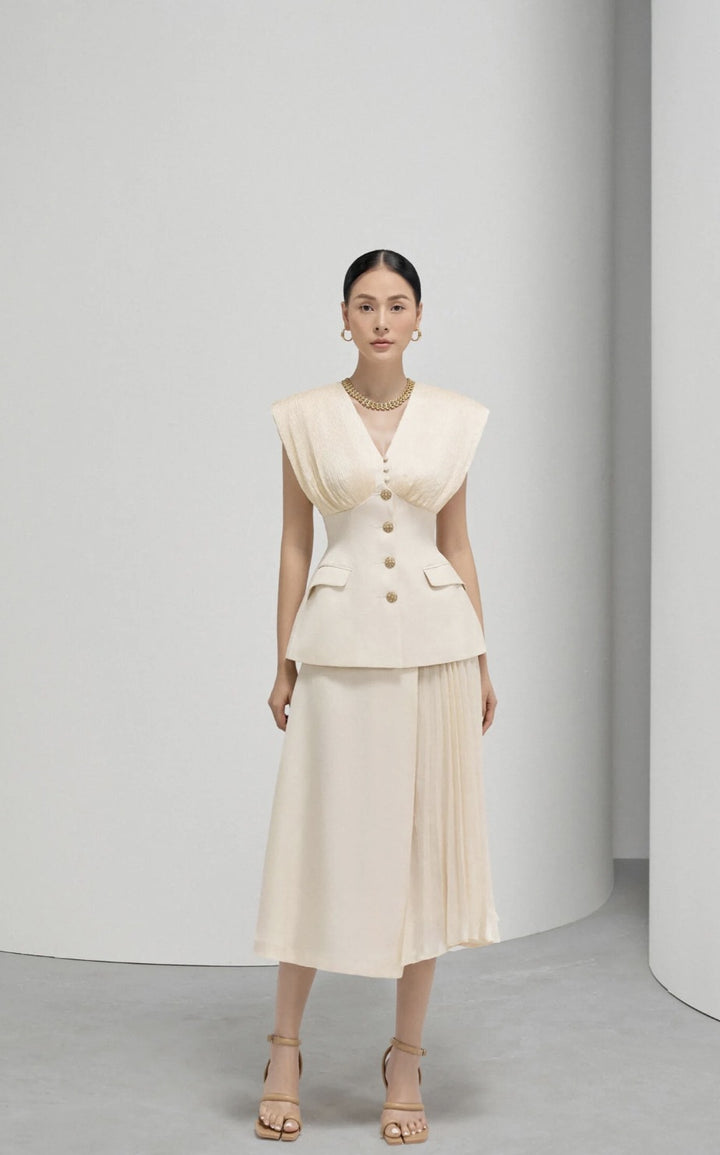 Elegant Beige Sleeveless Dress with Pleated Design and Gold Buttons